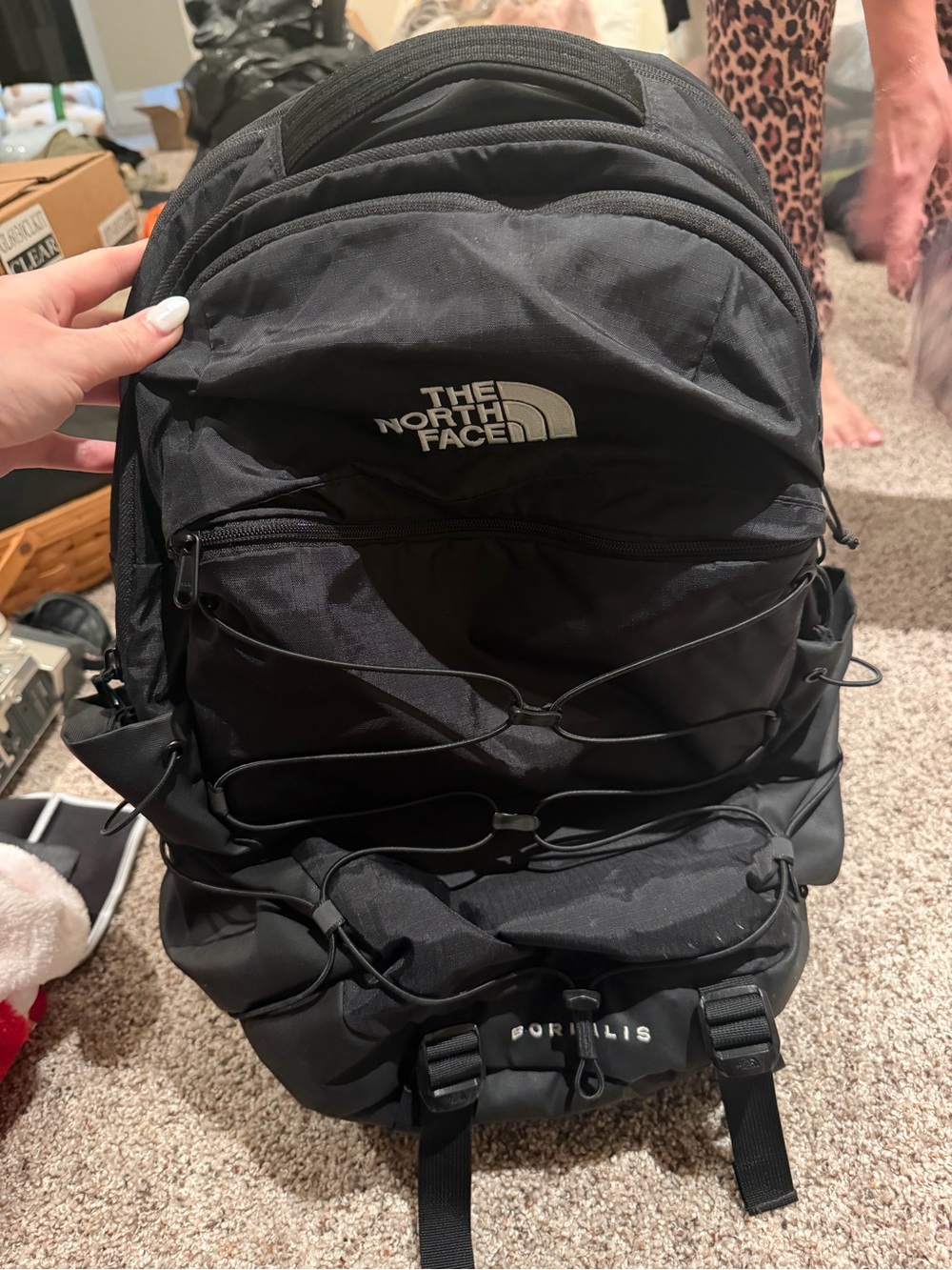 The North Face Black Daypack with Front Bungee and Multiple Compartments